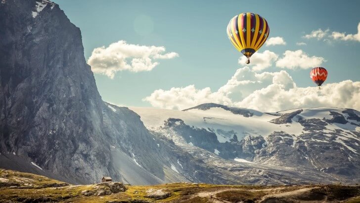 Hot Air Balloon Over the Mountain Wallpaper